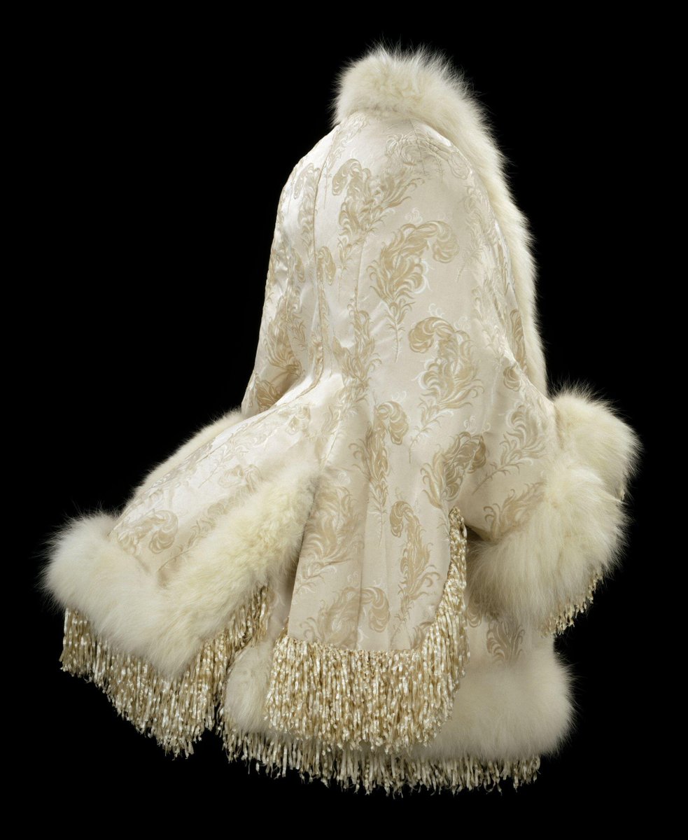 28 - This dolman from Pingat clearly is making way for the bustle! Bye bye shawls, hello dolmans. It's got arctic fox fur and chenille, and uses voided velvet. SWOON. Very White Witch.