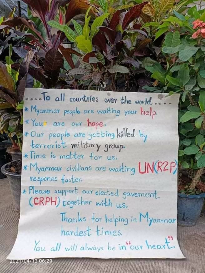 Myanmar_Now_Eng's tweet photo. Anti-regime messages are written on clay pots placed on the streets of Yangon on Tuesday to welcome Myanmar's New Year. The pots are a traditional offering to the 'nat' or spirit of the New Year Water Festival in what is this year being called #RevolutionaryThingyan https://t.co/fTYSas8Qpv