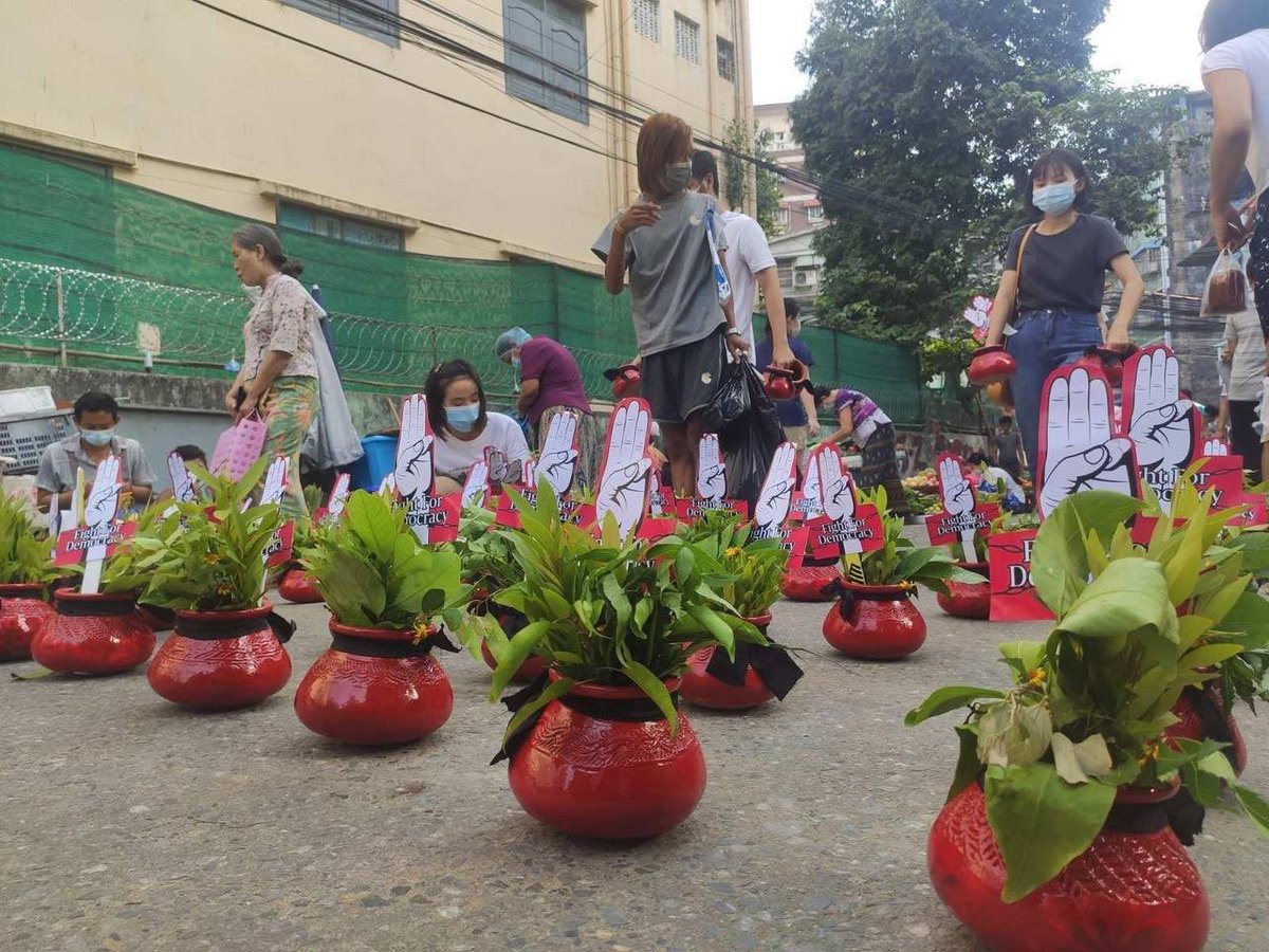 ZweMarn's tweet photo. Sanchaung: On the first day of Revolutionary Thingyan campaign, Ah Tar Oo (Traditional Thingyan pots) with 3 fingers salute messages are placed on the streets, demonstrating rejection to military rule. #WhatsHappeningInMyanmar #Apr13Coup https://t.co/cVq0kQCNeR