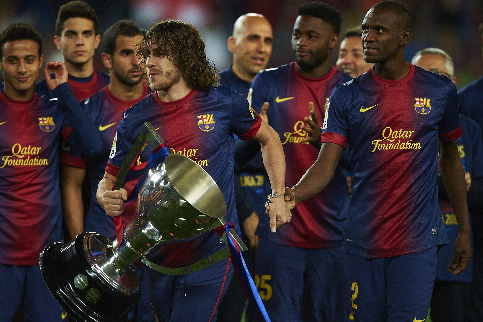 Football Tweet ⚽ on Twitter: "Throwback to the time Carles Puyol made Eric Abidal lift the trophy after his battle with cancer. Such a touching moment but the best part about this