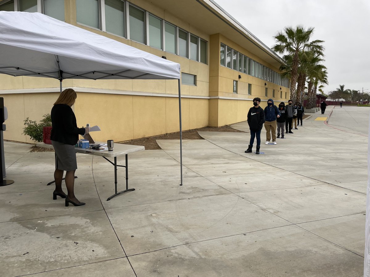 SOMBuccaneers's tweet photo. SOM students in line to get in. Second day of your n-person instruction. 4/13/21 https://t.co/nq6vf3468J