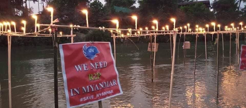 simon_lynn11's tweet photo. Night strike with candle lights along the stream
opposing the Dictators in Kachin state on Apr 13 night. 

#Apr13Coup
#WhatsHappeningInMyanmar https://t.co/gIStmDB4FY