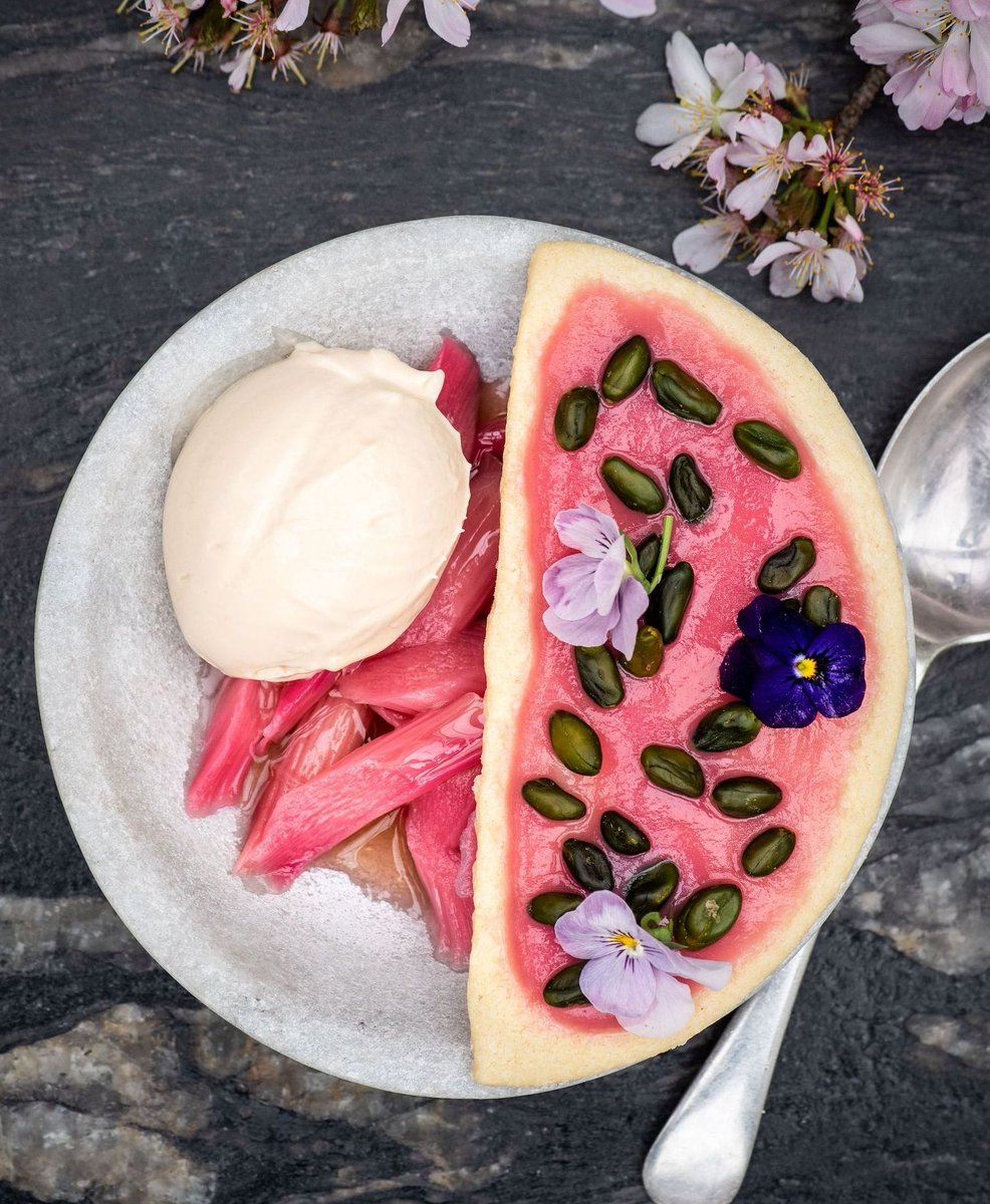 Rhubarb & Stem Ginger Ice Cream with Poached Rhubarb, Shortbread and Pistachio: Spring on a plate, at Petersham Nurseries Café. You can see what other seasonal flavours we are celebrating on the menu, on our website, where booking is open, too.