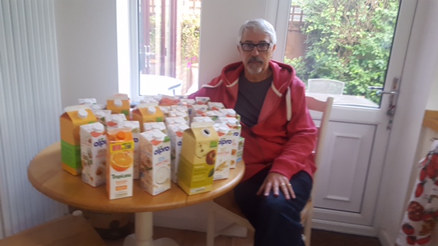 Brentwood Greens election candidate Paul Jeater with Tetrapaks not recycled by Brentwood