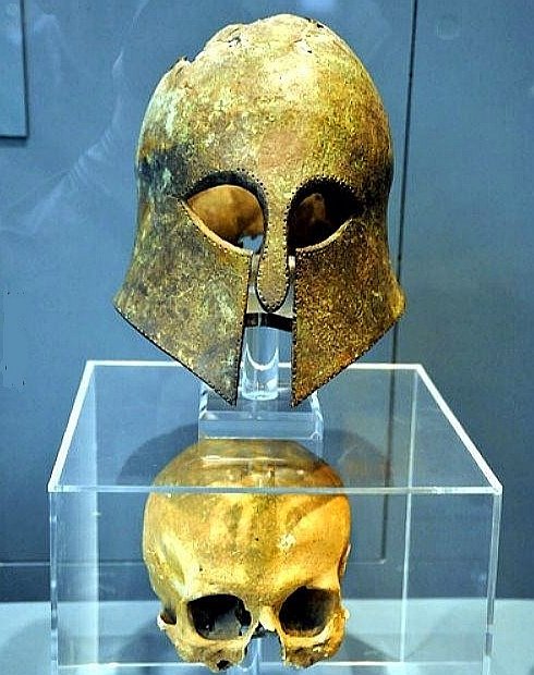 A 5thC BC corinthian helmet with the skull of a warrior inside supposedly found at the Battlefield of Marathon, Greece. The 192 Athenians killed in the battle were cremated, so there's a chance it belonged to one of the 11 Plataean allies who also fell during the fight in 490BC.