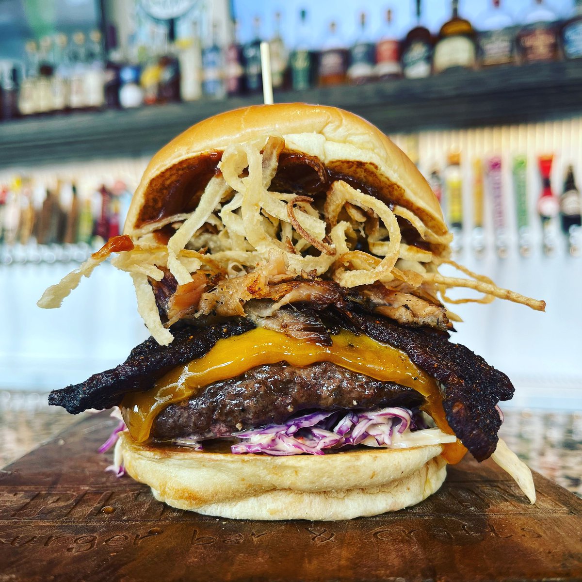 The Stimmy aka The Triple

Signature Beef Patty
Cheddar Cheese
Bar Bacon
Hand Pulled Pork
Horseradish Slaw
Onions Strings
Brioche Roll

#burgeroftheweek #pintroomlittleton #craftbeer #burgerbar #littletoneats