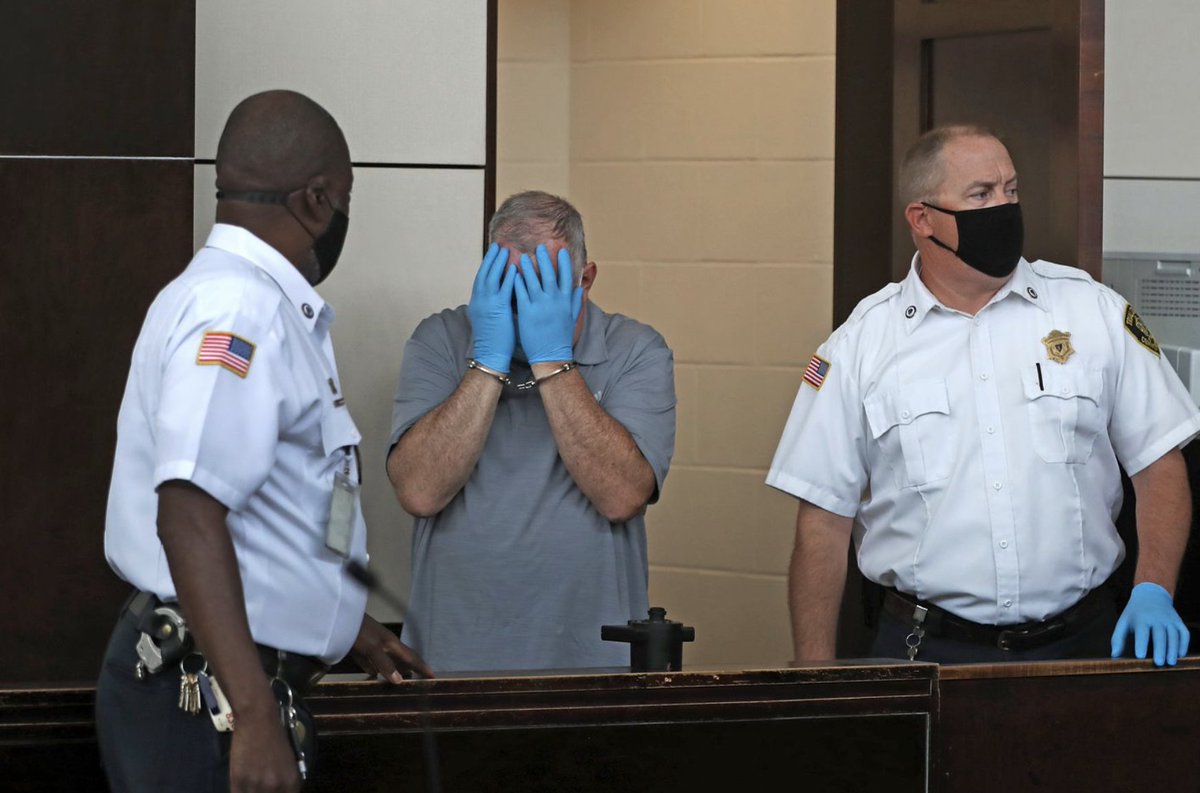 A picture of Patrick Rose covering his face during his arraignment in August 2020.