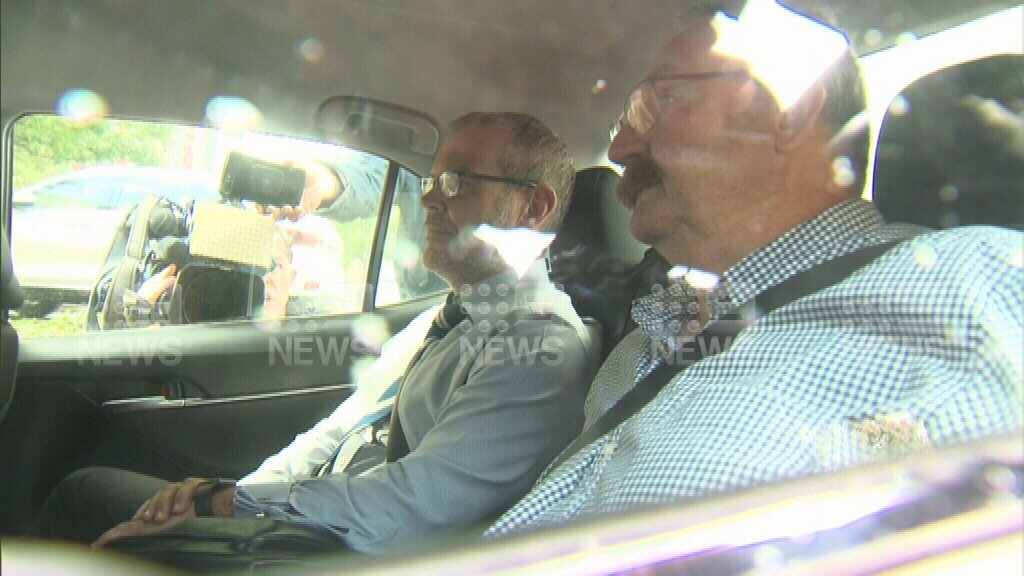 Rory_McClaren's tweet image. Flanked by detectives, the couple have been taken to the city watch house. They're expected to face court this afternoon. @alpsa has been approached comment but I've been told one won't come until the matter has been heard. #9newscomau