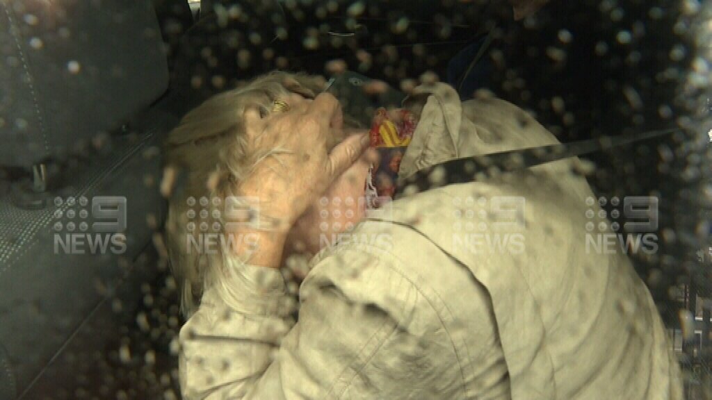 Rory_McClaren's tweet image. Flanked by detectives, the couple have been taken to the city watch house. They're expected to face court this afternoon. @alpsa has been approached comment but I've been told one won't come until the matter has been heard. #9newscomau