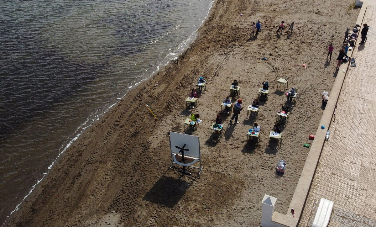 ANCALERTS's tweet photo. LOOK: After a year of remote learning and socially distanced classrooms, a school in the Spanish region of Murcia combines clear air and a new way of teaching.
(📷: Nacho Doce, Reuters) https://t.co/vk73m8Sv1w