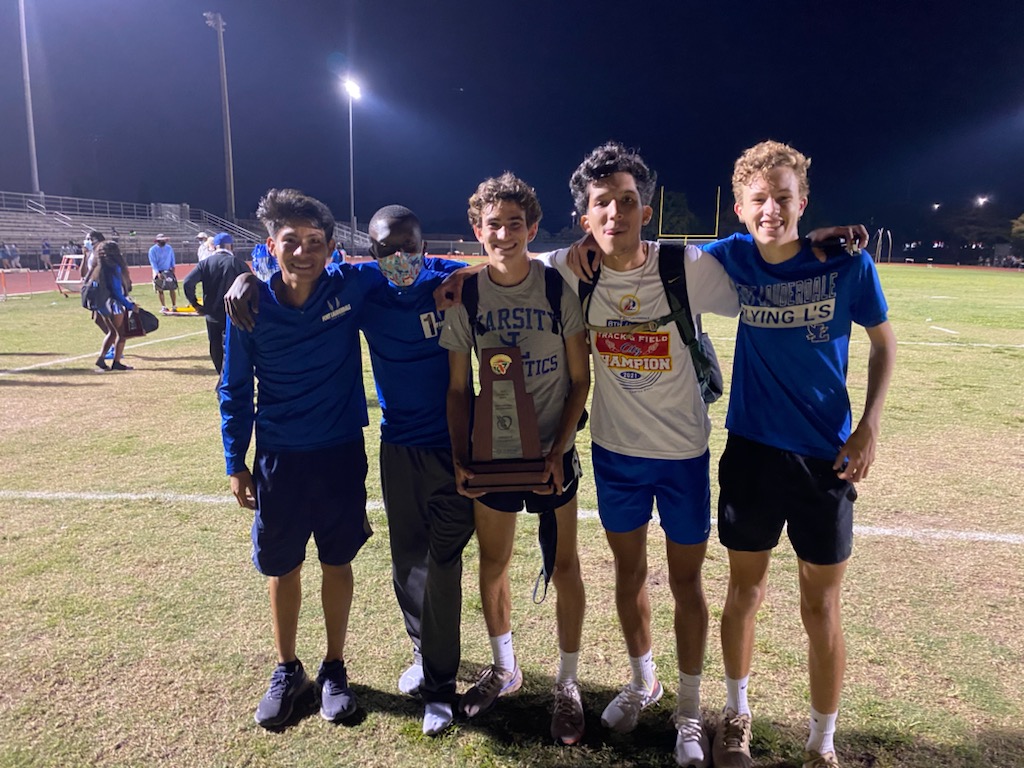 FlyingLsAthlete's tweet image. Flying Ls Boys Track&amp;amp;Field team wins the DISTRICT CHAMPIONSHIP tonight in dramatic fashion, beating St. Thomas Aquinas by 4pts Congrats Coach Martin (look at that cheese), Coach Murillo Coach Fulton &amp;amp; especially the young men who won the trophy. 2 milers went 1,2,3,4 to score big
