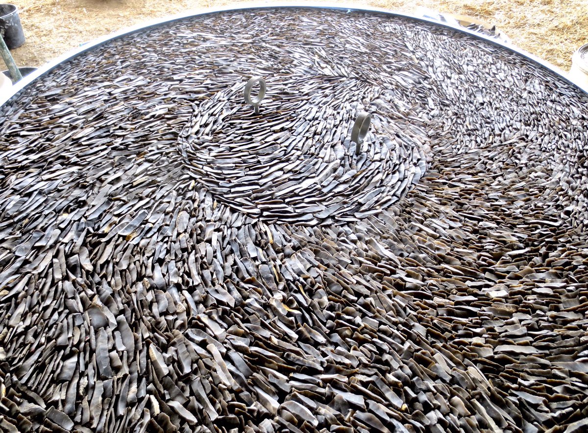 flintmancompany's tweet photo. Flint gallet circle detail on table top. Looking forward to eating off one of these tables.  #circle #table #gallets #flint #flintwork ##flintwall #kitchentable #architecture #flintknapper #flintknapping #lime #heitageskills #furniture https://t.co/04m20GkOzt