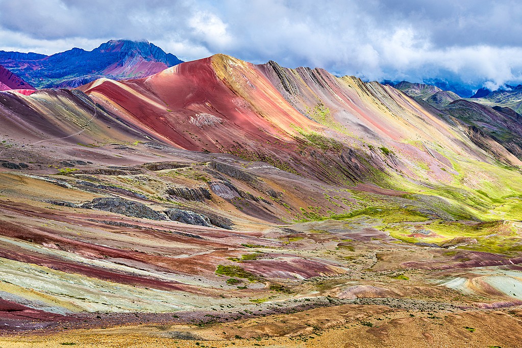 Today we're visiting an amazing natural site, Vinicunca, also spelled Vinikunka & also called Montaña de Siete Colores or Montaña de Colores (which means Mountain of Seven Colors & Mountain of Colors) or Rainbow Mountain. It's part of the Andes Mountains and is at 17,100 ft......