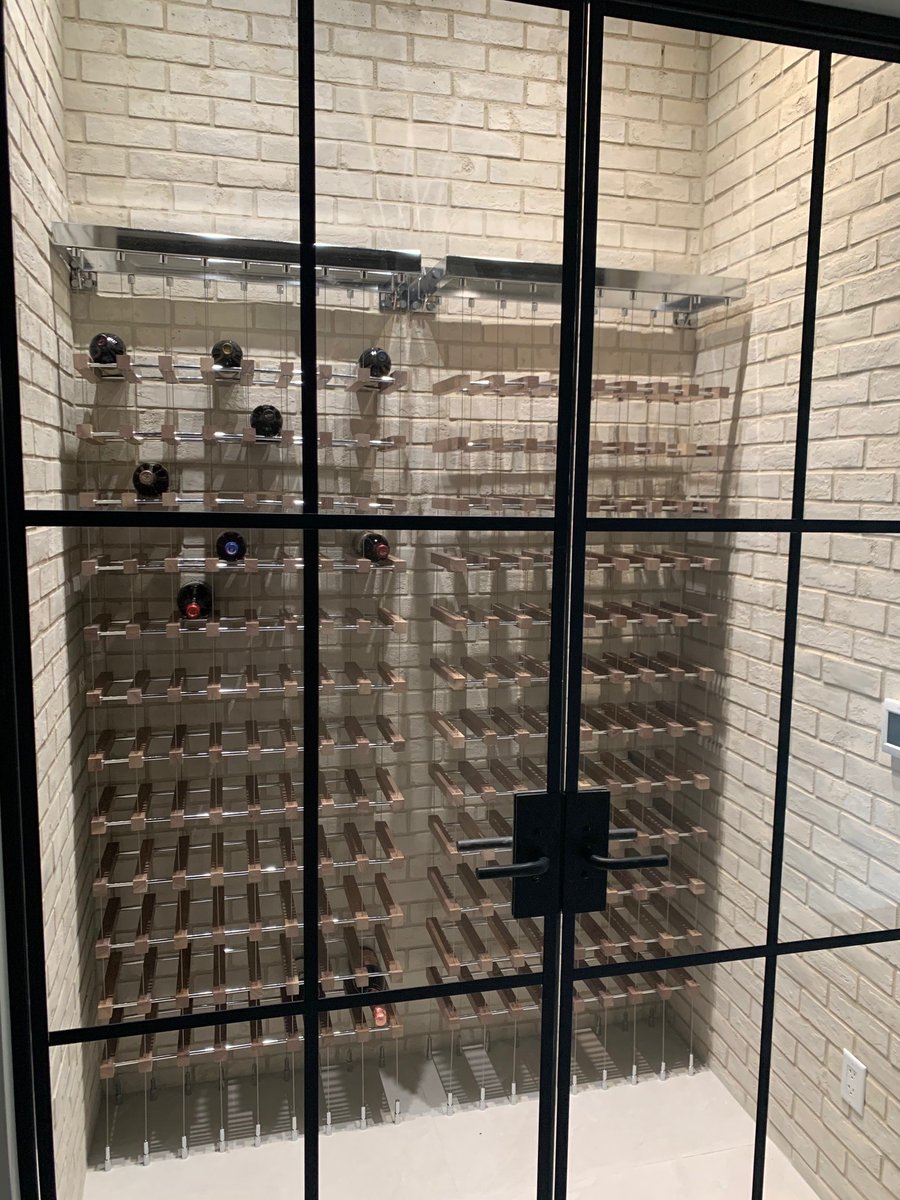 uniquelectrical's tweet image. This client added a wine room to their new home. If you had the space, would you add one too??
