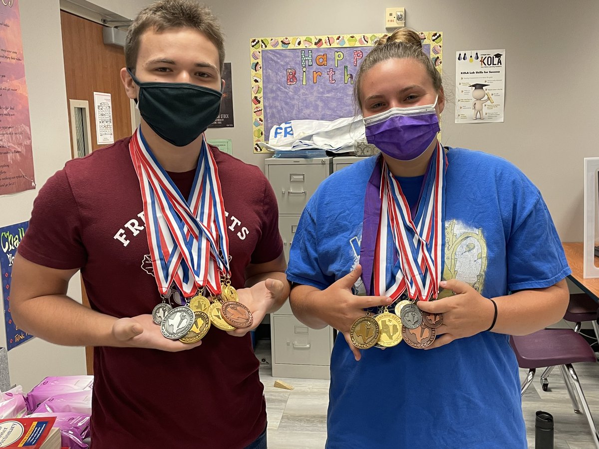 reveille93's tweet photo. State and Region medals arrived today. These two are making some nice clanking sounds after a great year for Academic Decathlon!! #acadecrocks #bigbrains #purplepride @MRHSMavericks @AcadecMrhs https://t.co/z62uyJEzKh