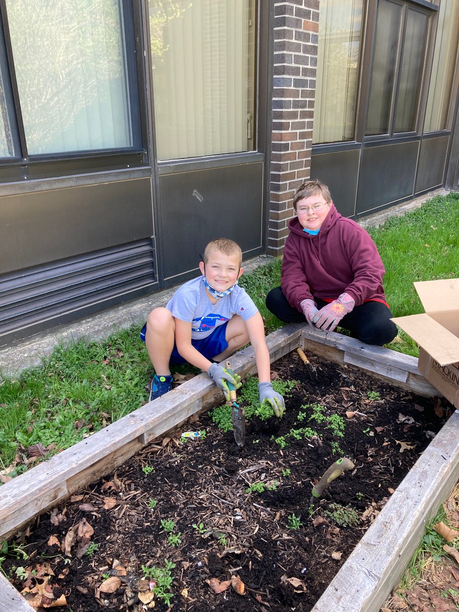 knugent5's tweet photo. Some 5th grade Reynolds students at STEM Club. We are cleaning up the courtyard and getting ready for planting! @ReynoldsBville @BCSDBEES https://t.co/YQ3LYlPqsP