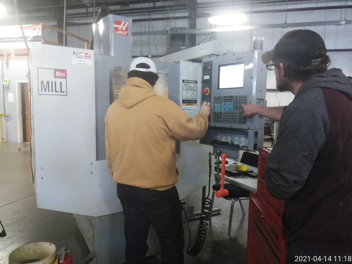 masc_and's tweet photo. Its awesome to see, with all the noise from the different machines being worked on around the shop floor, that student and teacher are in the zone and working on the CNC machine. #focused https://t.co/wO1imMhpi0