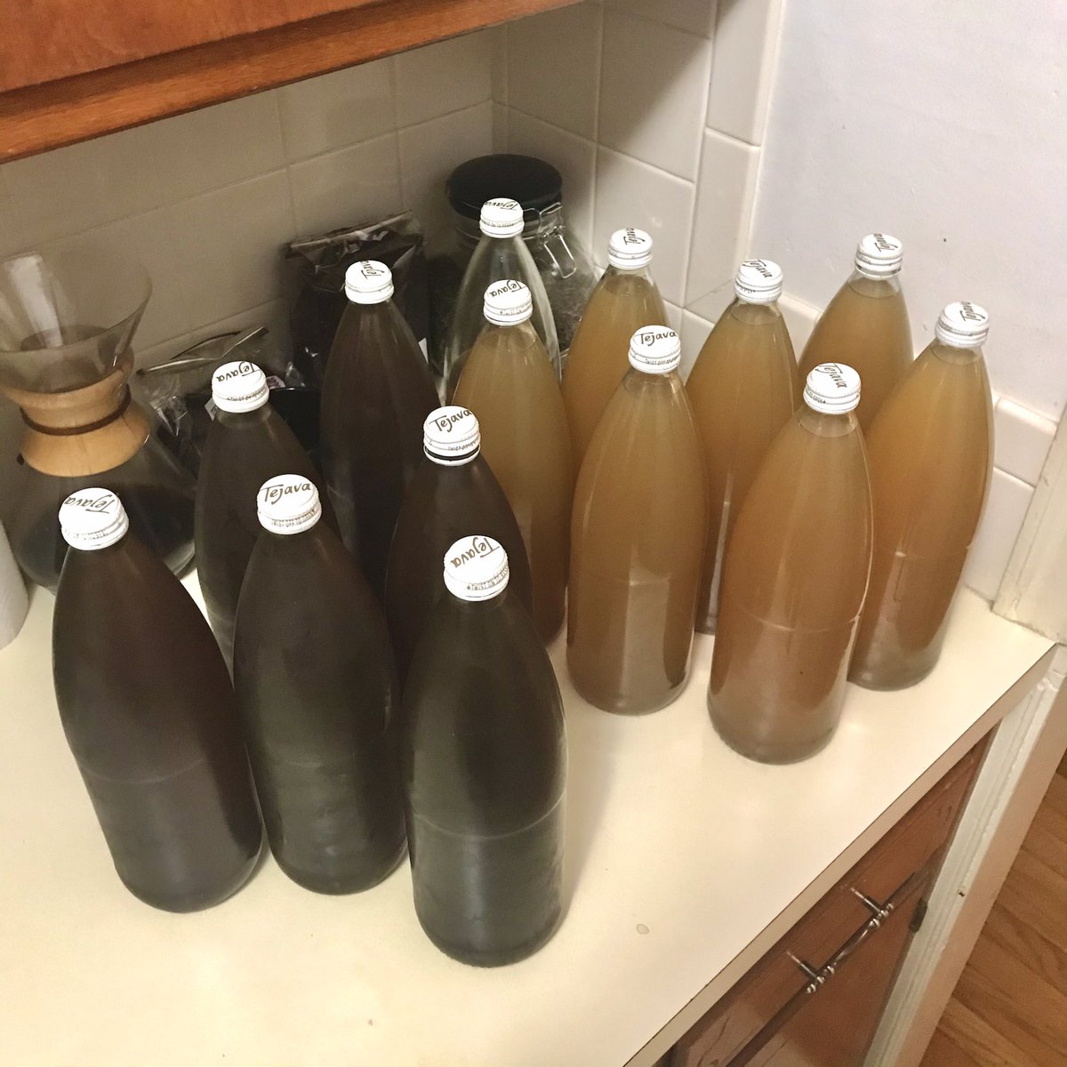 brewed &amp; bottled 540 fl oz of my own tea blends aka Ben’s Blends. black strawberry mango (left) &amp; green lemon mint (right)