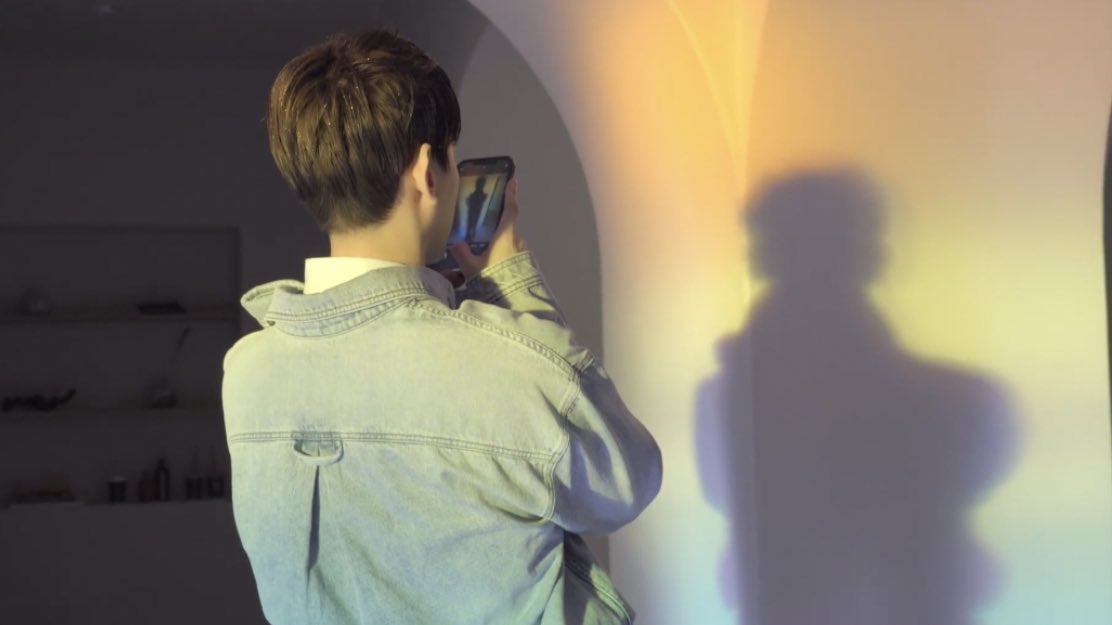 bhyunsource's tweet photo. baekhyun taking photos on set ♡ https://t.co/MGZJB0an9w