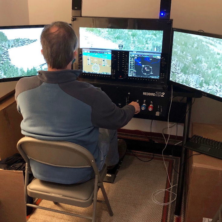 RaleighExec's tweet photo. Pilot Mike Fox tries out glass cockpit flying for the first time using the Redbird TD2 flight simulator recently installed by the Odyssey Aero Club in the Raleigh Exec terminal.

#RaleighExec #RaleighExecTerminal #RaleighExecCompanies https://t.co/yoJfmIK8K0