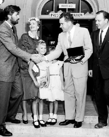 here's Wood giving Nixon the key to Disneyland, lol