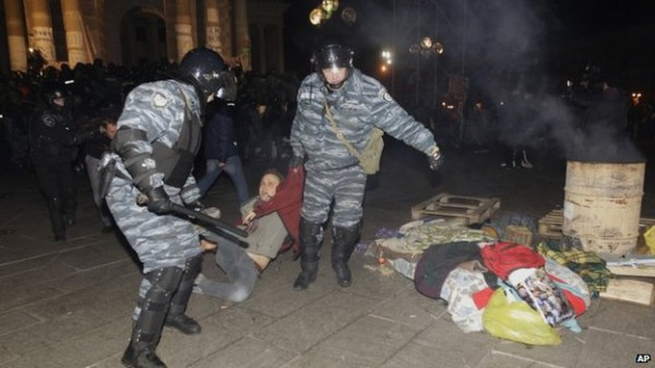 The notion of the protests being a "violent coup" is ahistorical - it started entirely peaceful, and the escalation was driven by security forces - from when Berkut riot police violently dispersed a sleep-in at Kyiv's Maidan (Independence Square) in late November 2013.