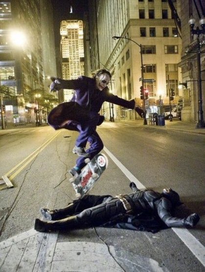 Happy birthday heath ledger. here s a picture of him skating over christian bale on the dark knight set. 