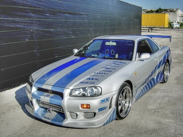 DrivinTheater's tweet photo. The F&amp;F Hero Car final matchup is here! Both entries are worthy of the top spot, but you'll have to decide who claims it. Jensen Interceptor vs. R34 Skyline GT-R. https://t.co/Eddjcz8nAa