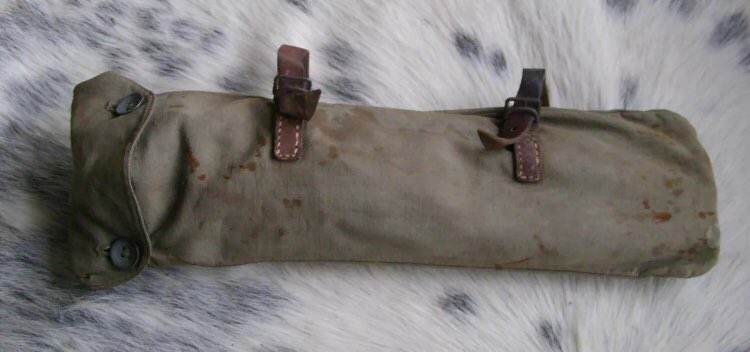 At a personal level, a Landser was issued with one Zeltbahn, one wooden pole, two aluminium/steel/bakelite pegs & rope. All contained in a carrying case. Practicality in the field often saw change, with additional items being procured & retained within a rolled Zeltbahn. 4)