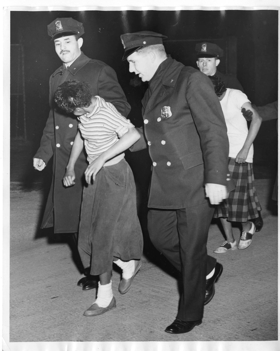 Here's an image of police officers arresting Black girls for "inciting a riot" and taking them to the "National Training School for Girls." (Image: DC Public Library, Evening Star)