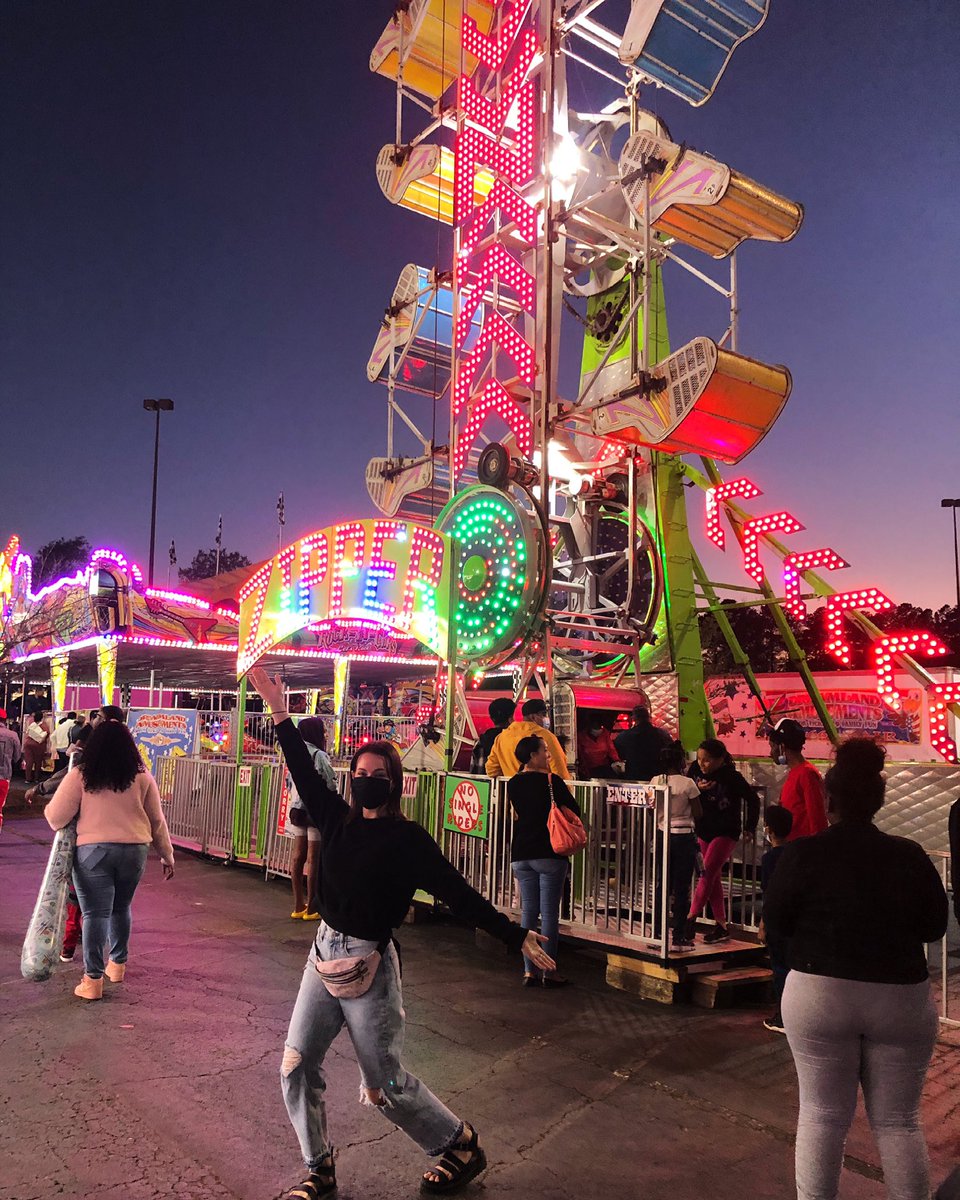 A girl and her favorite flat ride.