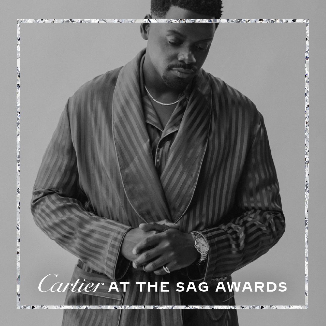 Cartier's tweet photo. Congratulations to the #SAGAwards 2021 winner #DanielKaluuya in a C de Cartier necklace, #BallonBleu de Cartier watch and a #TrinitydeCartier ring. #CartierRedCarpet at home https://t.co/gn6rlj3iL1