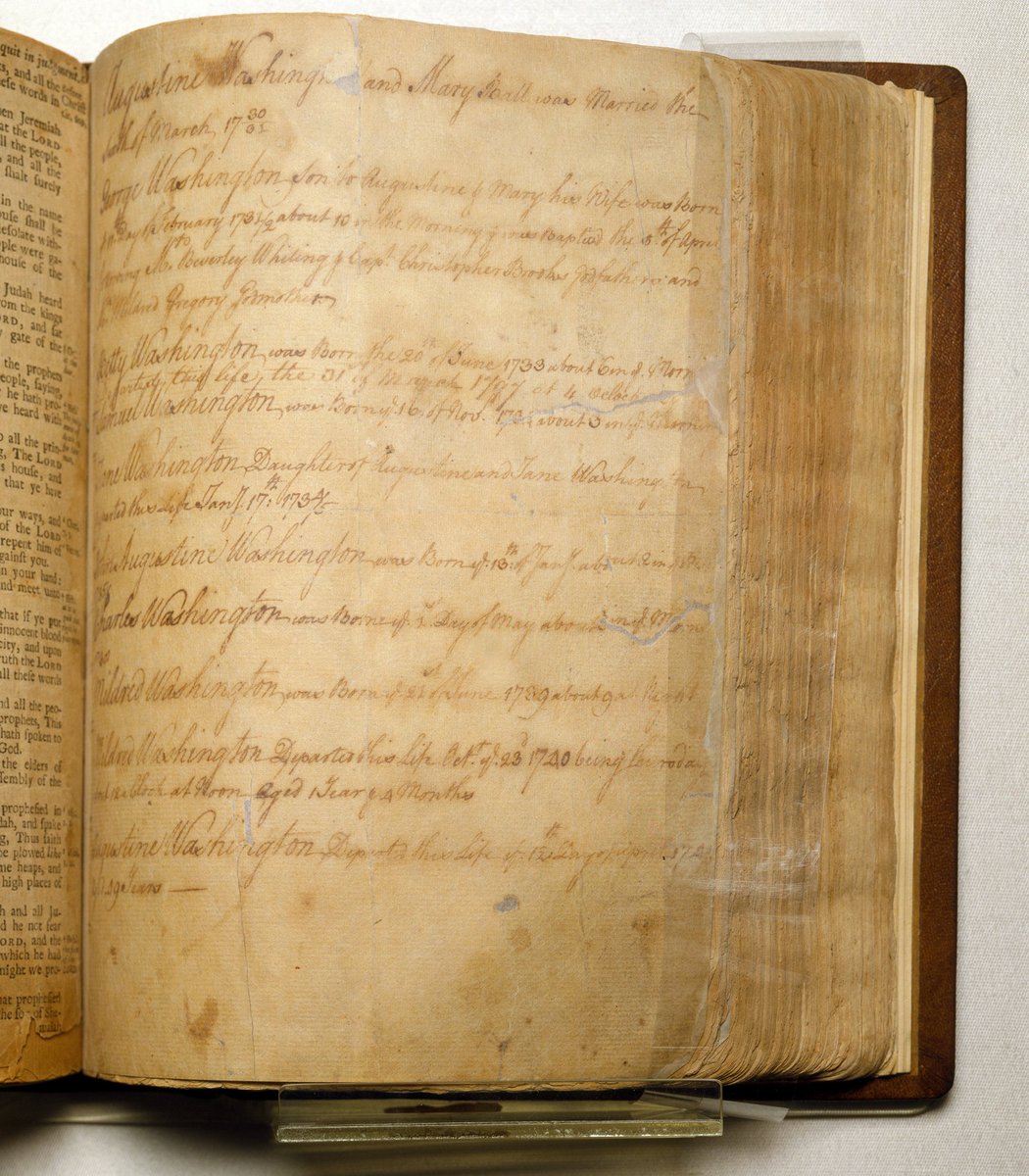 MountVernon's tweet image. The Washington family Bible, which contains a sheet of paper carefully inscribed with the date George Washington was born &amp;amp; when he was baptized, which was #OnThisDay in 1732. The Bible is in our Museum Collections, which you can explore at home at bit.ly/347HT1S