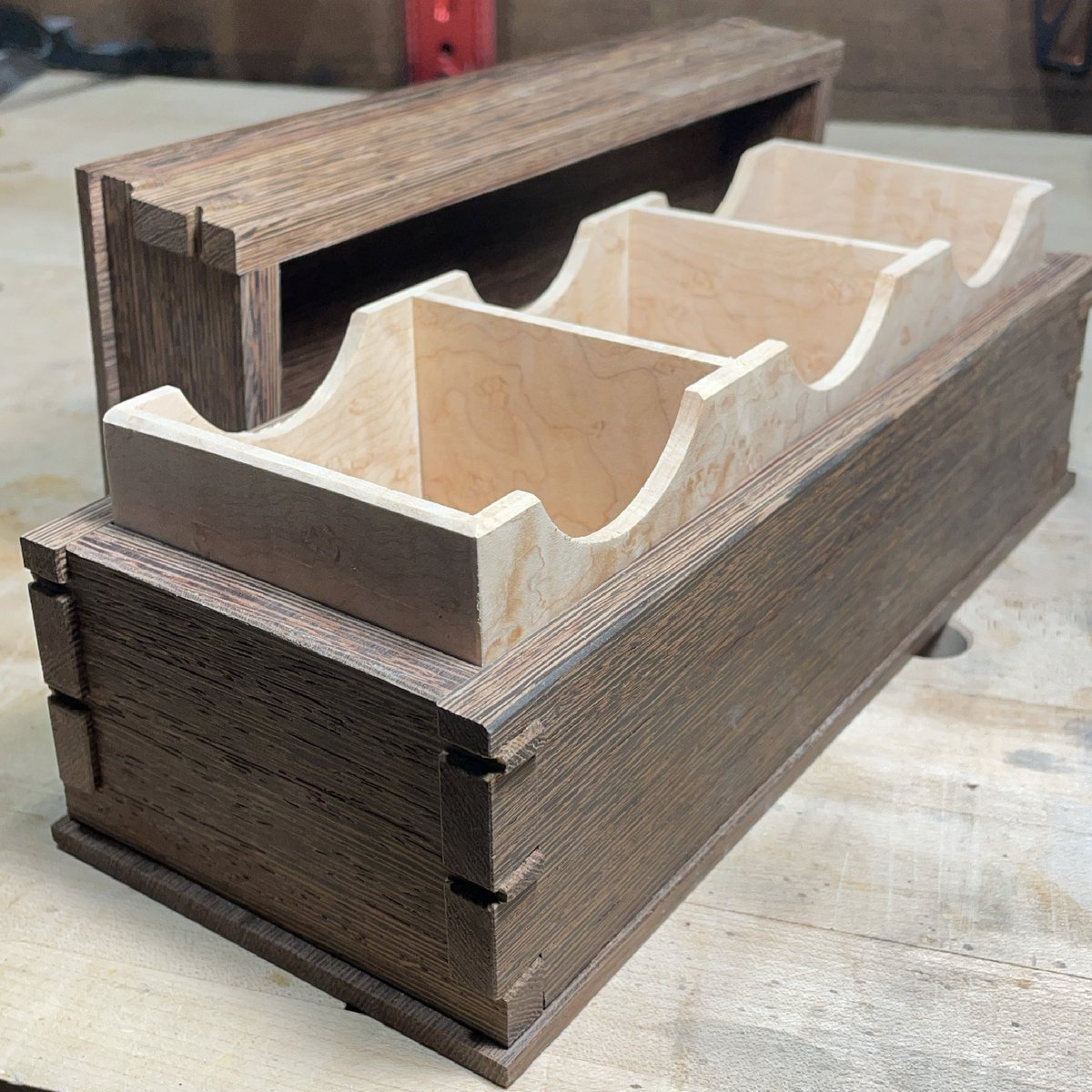 Sc0FF's tweet image. The wenge Tea box coming along nicely.  I’ve completed and fit in the curly/Birdseye maple liner. #woodworking #handtools #ottawamakers #teaboxbuild #wenge #tea #teabox #dovetails