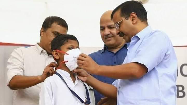 Three wiseman without a mask teaching a kid to wear one ! 😃😃 #COVIDSecondWave #ArvindKejriwal