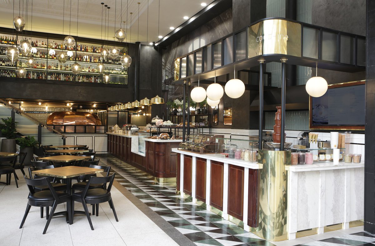 Our Makuti Chair in an on-trend dark stain 👌. 

Spotted here at the beautiful <a href="/DoppioZeroSA/">Doppio Zero</a> Sandton , designed by the hugely talented Story Design Collective 🙌👌.
Makuti - bit.ly/3cQJ4Zl