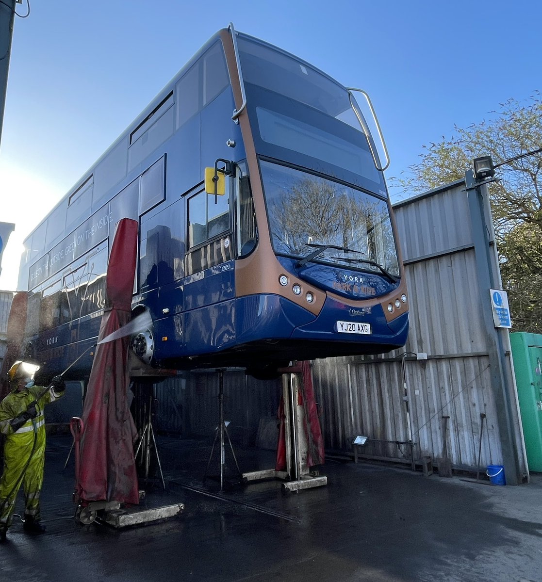 Blue bus in the blue skies above #York. Dave from our @FirstYork engineering team is preparing one of our electric⚡️ <a href="/Optaregroup/">Optare</a> buses for its MOT this morning.