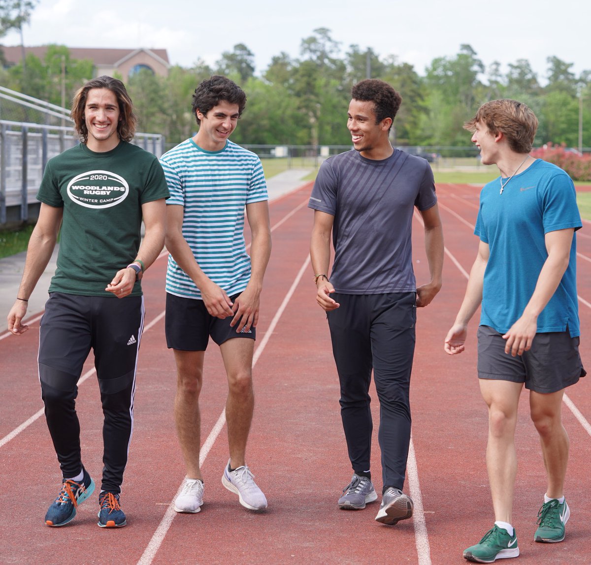 The Woodlands high school track &amp; field student-athletes prepare for a practice session following their team photos on March 5, 2021, at the woodlands high school senior campus.