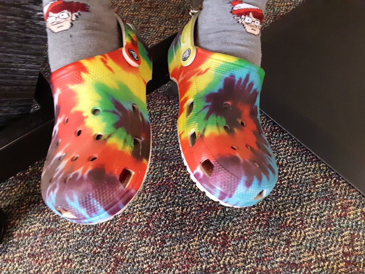 HDHSnurse's tweet image. HDHS administrators showing off their team sprirt as part of our staff "spring into wellness". Tie dye Tuesday #HDHSPride #staffwellness #springintowellness