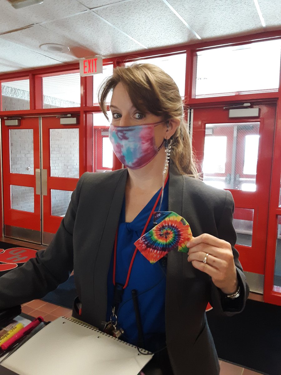 HDHSnurse's tweet image. HDHS administrators showing off their team sprirt as part of our staff "spring into wellness". Tie dye Tuesday #HDHSPride #staffwellness #springintowellness