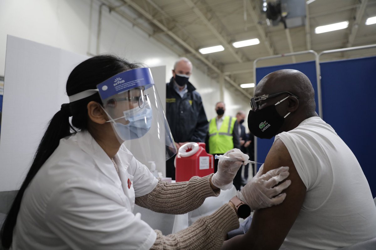 GovMurphy's tweet photo. Our port workers have been on the front lines of this pandemic, moving medical supplies, groceries, and other necessities across our state.
 
Today, I joined them as they received the #COVID19 vaccine at the @ILAUnion &amp; @cvspharmacy-operated vaccine site at the Elizabeth Seaport. https://t.co/10QCq8ML4L