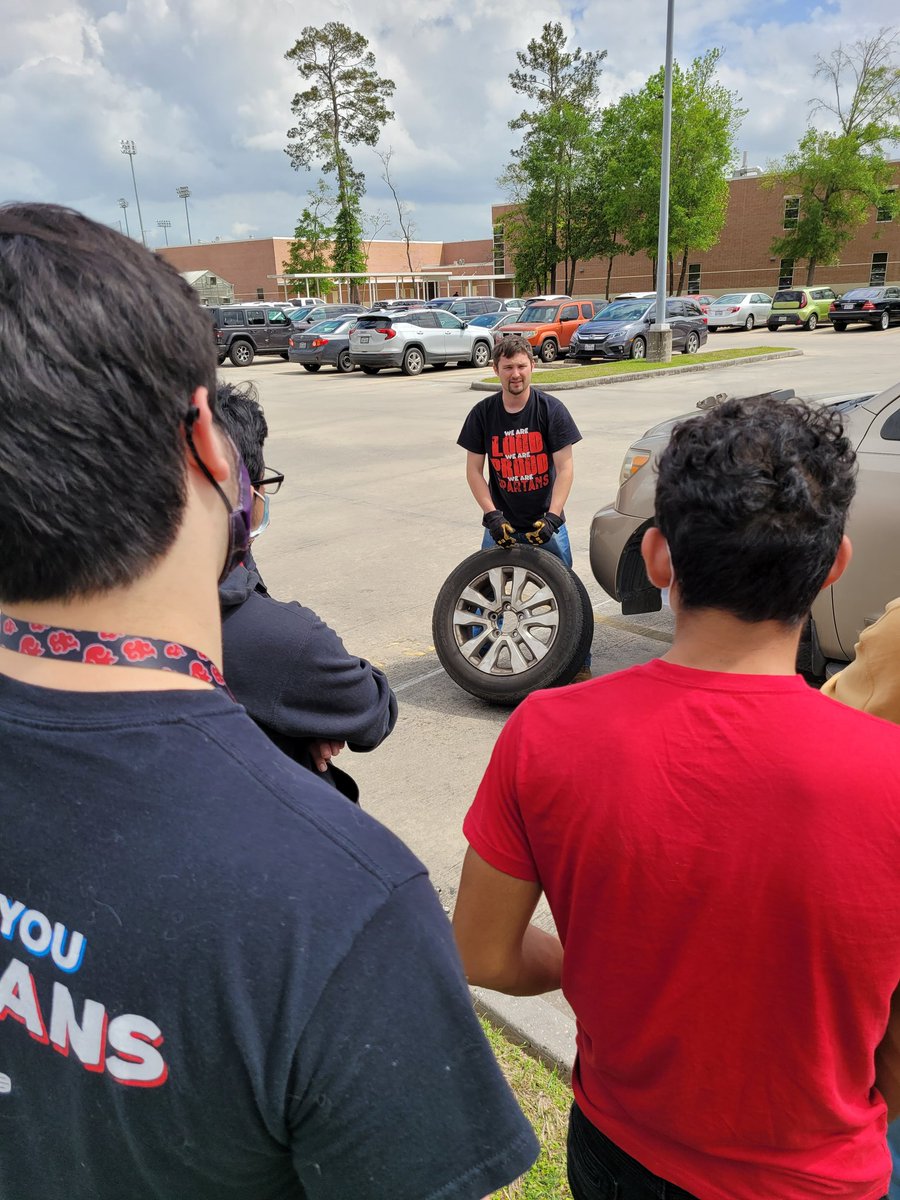 ahons_cte's tweet image. Mr. Fortenberry and Mr. Froman are co-teaching seniors on how to change a tire! #reallifestuff @PorterSpartans #spartanslearn