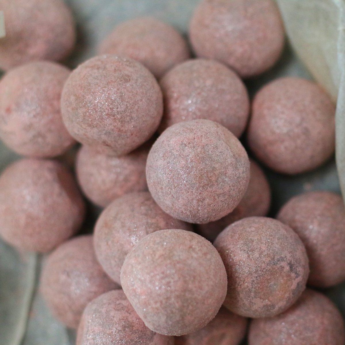 Milk chocolate Marc de Champagne flavoured truffles, dusted with freeze dried strawberries... yes please! #LirChocolates