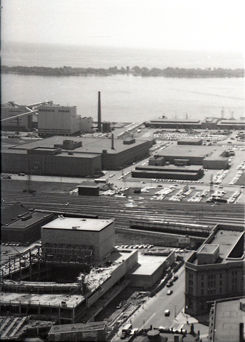  #TPBscan #5Last shot from this roll (presumably others have been lost over the years).Looking SE, over the LCBO office/warehouse, towards the Redpath plant. Coolest part of this shot is the O’Keefe Centre, under construction, in the foreground.
