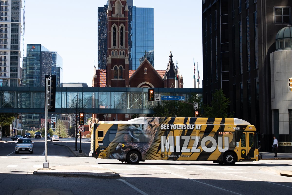 Mizzou's tweet photo. Rumor has it there's a #Mizzou Tiger bus on the prowl on the streets of downtown Dallas. 

#IChooseMizzou 🐯🚌 https://t.co/68Y2N2BGqf