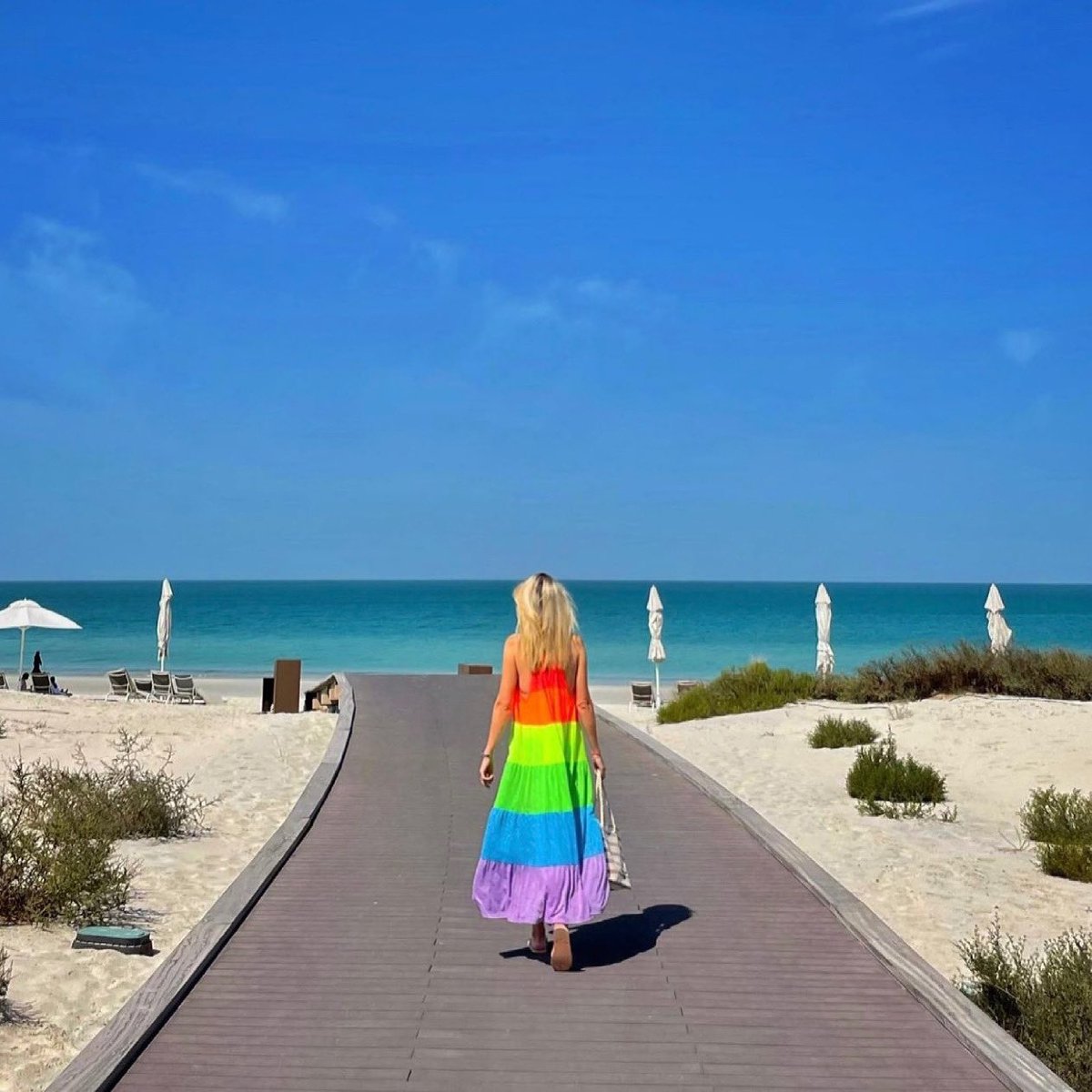 Pitusa_co's tweet photo. Paradise found with @thelittlebrownblog in the Popsicles Halter Dress ✨🌈 #Pitusa https://t.co/4HYHex6zXB