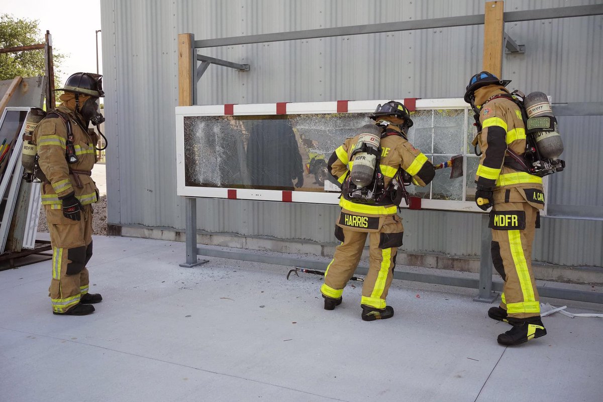 MiamiDadeFire's tweet photo. On Wednesday morning, crews from #Station65 took part in a training exercise with a unique training prop that allows them to experience how to gain entry to a structure through hurricane impact windows in the event of a fire. #MDFRTraining https://t.co/CAZSemtzOB