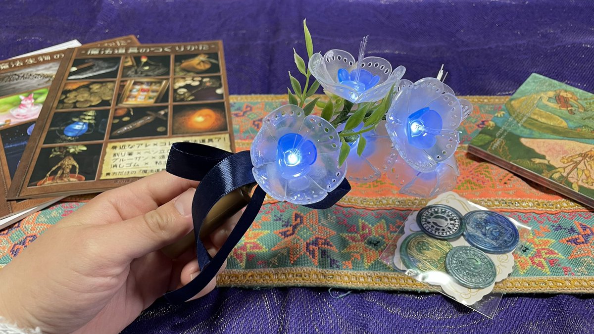 kaorila37's tweet photo. #星森魔法市　のお迎え品⭐️
迷光堂さん（@m_ignisfatuus ）のお花２つ、ゴシッ��ホリックさん（@gothicholic2 ）のクマ耳、三日月ノ木さん（@crescent_tree ）のブレスレット、コノスさん（@conos_jp ）の魔法道具の作り方の本など3冊とCD、謎猫城さん（@nazo_neko_jou ）のシーリングスタンプシール https://t.co/fVjA0F7MBI