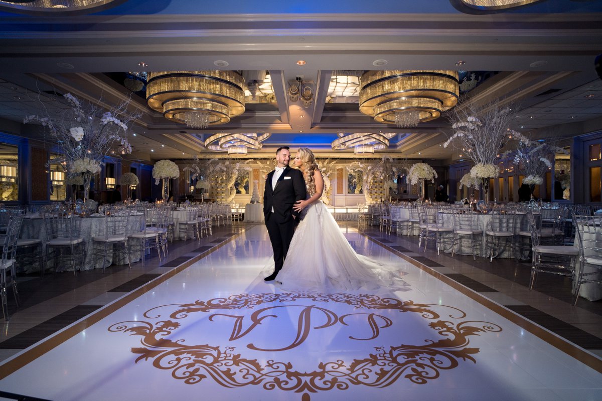 Notice something different on the floor of the Encore Room? That's our GOBO, an enhancement where we can write your initials for all your guests to see. A simple addition that makes a huge difference ❤️