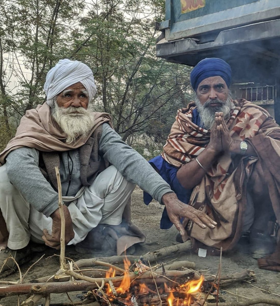 UK51NGH's tweet photo. #FarmersProtest is still ongoing on the roads of Delhi. Farmers are not returning home until all 3 Black Farm Laws are repealed. They beat the cold winter and now face the hot summer, 300+ deaths... all this blood is on the hands of the Indian Govt! #NoFarmersNoFood https://t.co/sTmbnEr2tu
